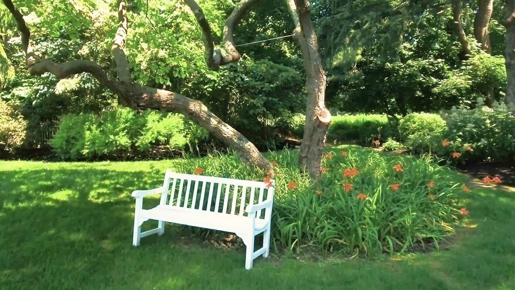 17 Cushing Street Hingham, MA 02043 - Photo 9 of 41 a view of a bench in a garden