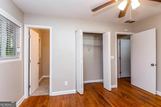 a view of livingroom with hardwood floor and hallway