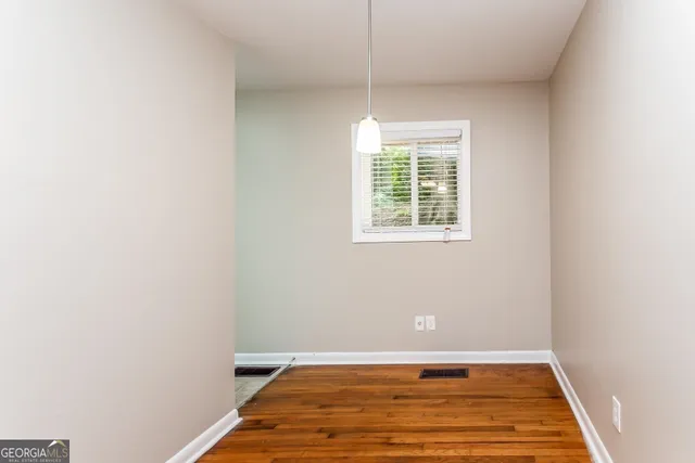 a view of a room with a window