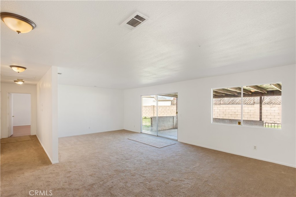 2348 Los Altos Circle Hemet, CA 92545 - Photo 15 of 35 an empty room with windows