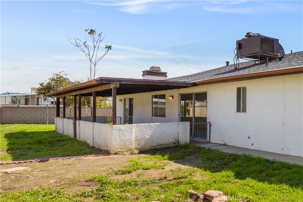 2348 Los Altos Circle Hemet, CA 92545 - Photo 27 of 35 a front view of a house with a yard
