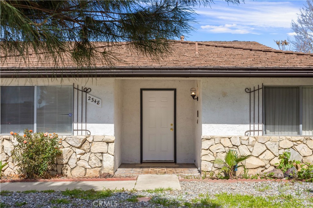 2348 Los Altos Circle Hemet, CA 92545 - Photo 4 of 35 a view of a door front of a house