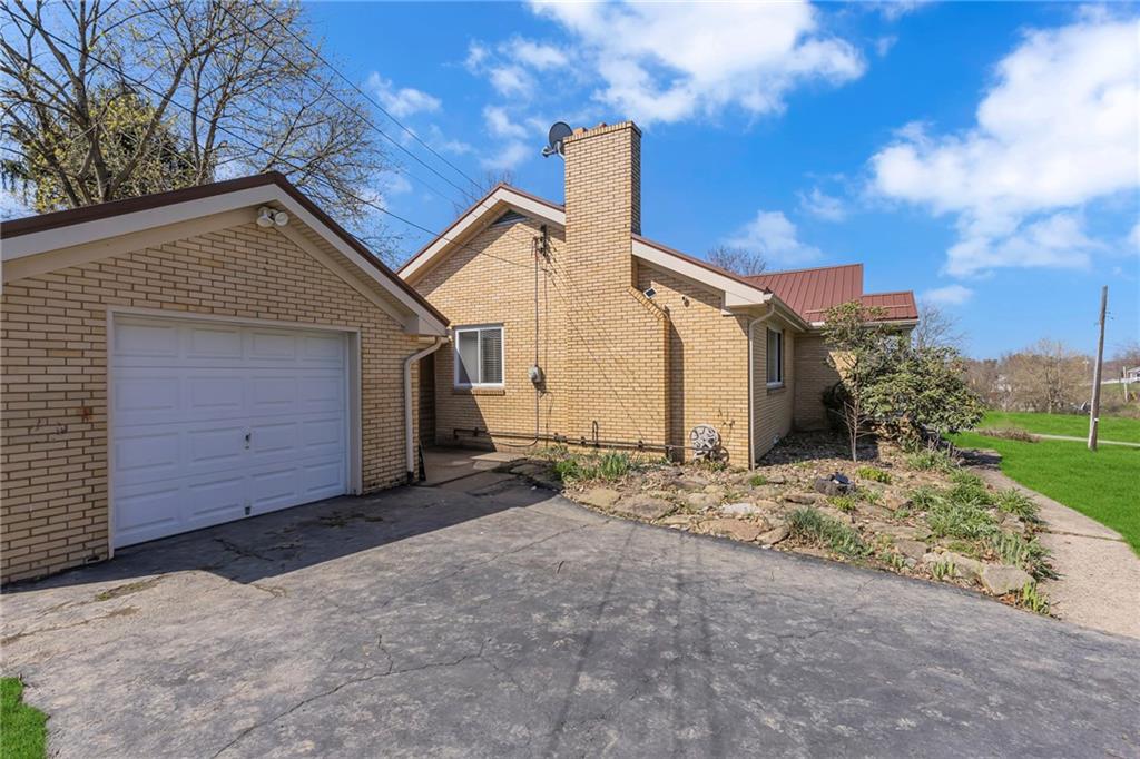 1720 Conway Wallrose Road Freedom, PA 15042 - Photo 37 of 38 Garage / driveway