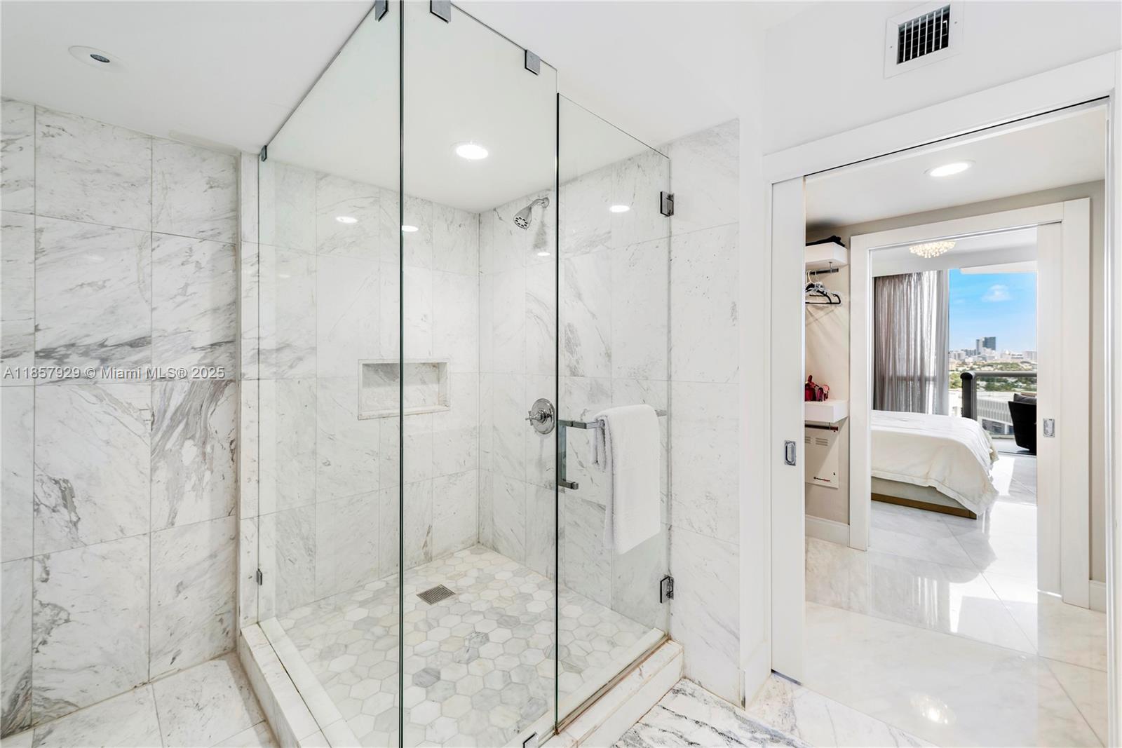 400 Alton Road, Unit 1405 Miami Beach, FL 33139 - Photo 12 of 18 a bathroom with a shower and a sink
