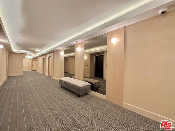 a room with a bed and a view of bedroom