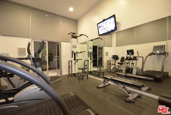 a view of a room with gym equipment