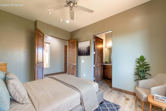 322 340 E Street Ivins, UT 84738 - Photo 36 of 61 Bedroom featuring light wood-finish flooring, a ceiling fan with integrated lighting, recessed ceiling lights, and two panel doors