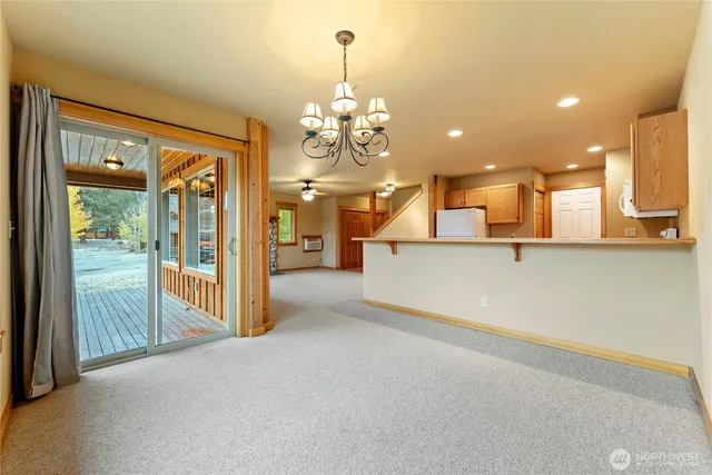 a kitchen with stainless steel appliances granite countertop a stove and a refrigerator
