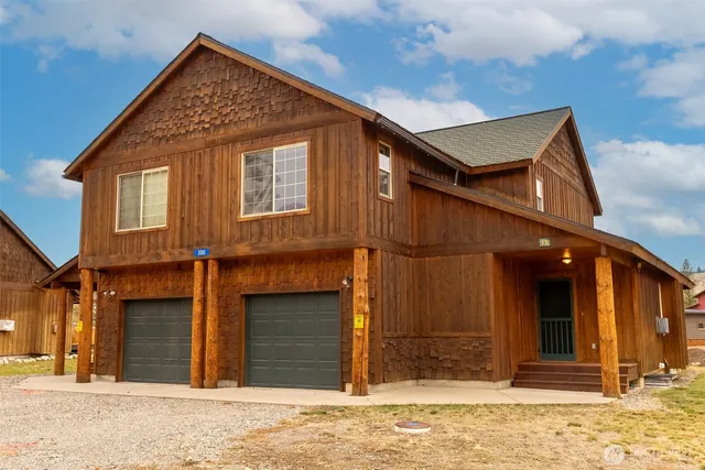 a view of a bathroom with a tub and shower curtain
