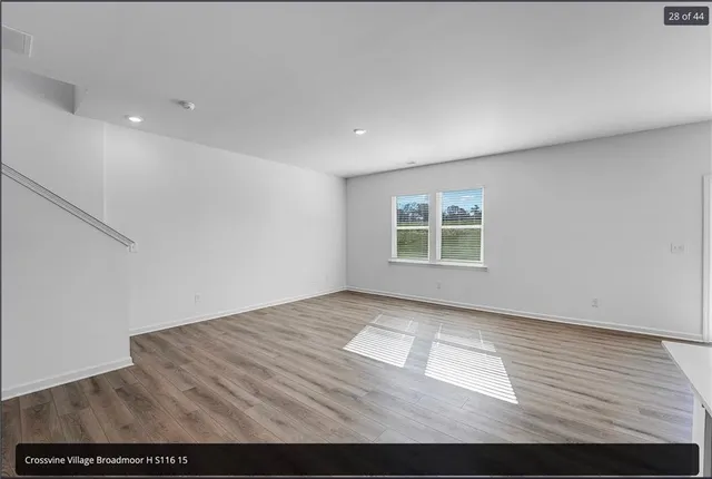 a bathroom with a sink toilet vanity and shower