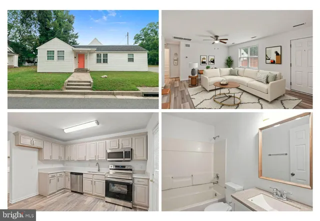 a view of kitchen with kitchen island and stainless steel appliances