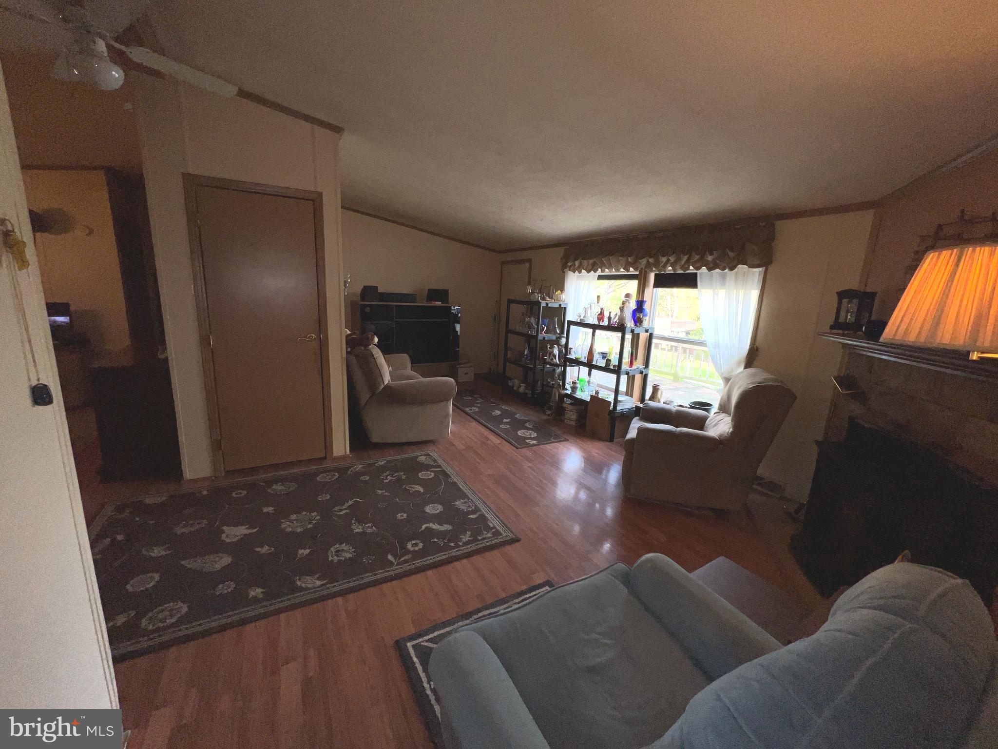 957 Cider Press Road Manheim, PA 17545 - Photo 7 of 16 a living room with furniture and a flat screen tv