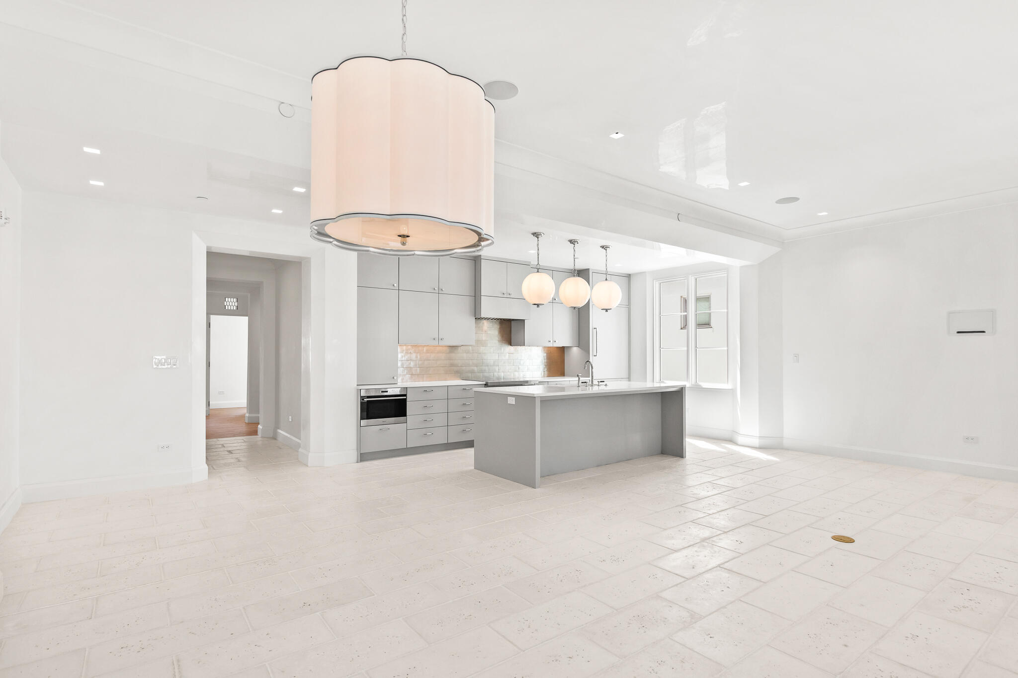 30 Mark Twain Lane, Unit 303 Inlet Beach, FL 32461 - Photo 12 of 34 a large white kitchen with a large window