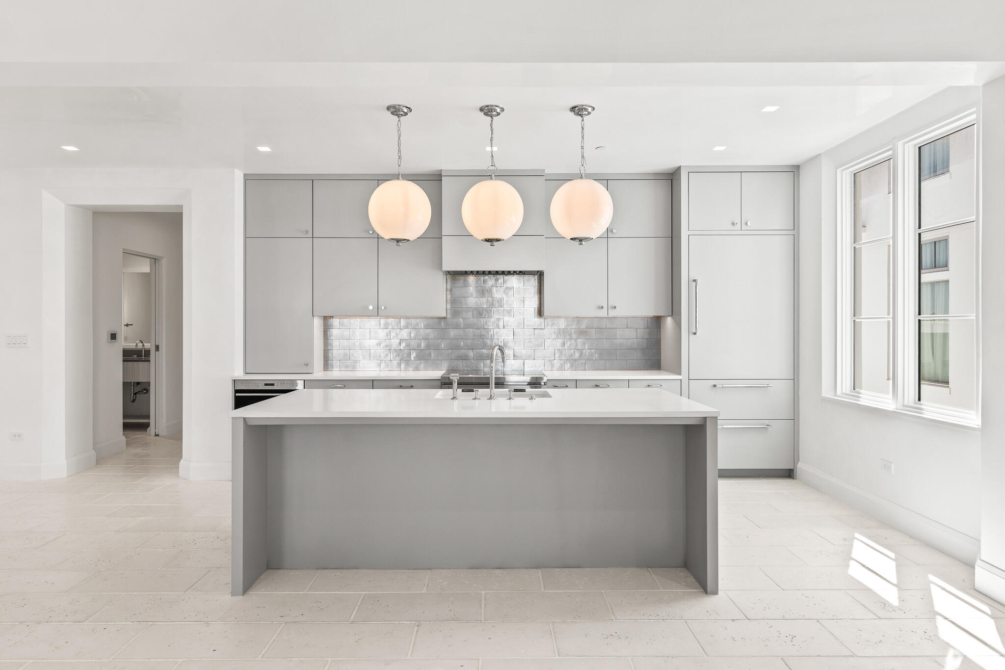 30 Mark Twain Lane, Unit 303 Inlet Beach, FL 32461 - Photo 15 of 34 a view of a kitchen with a sink and chandelier