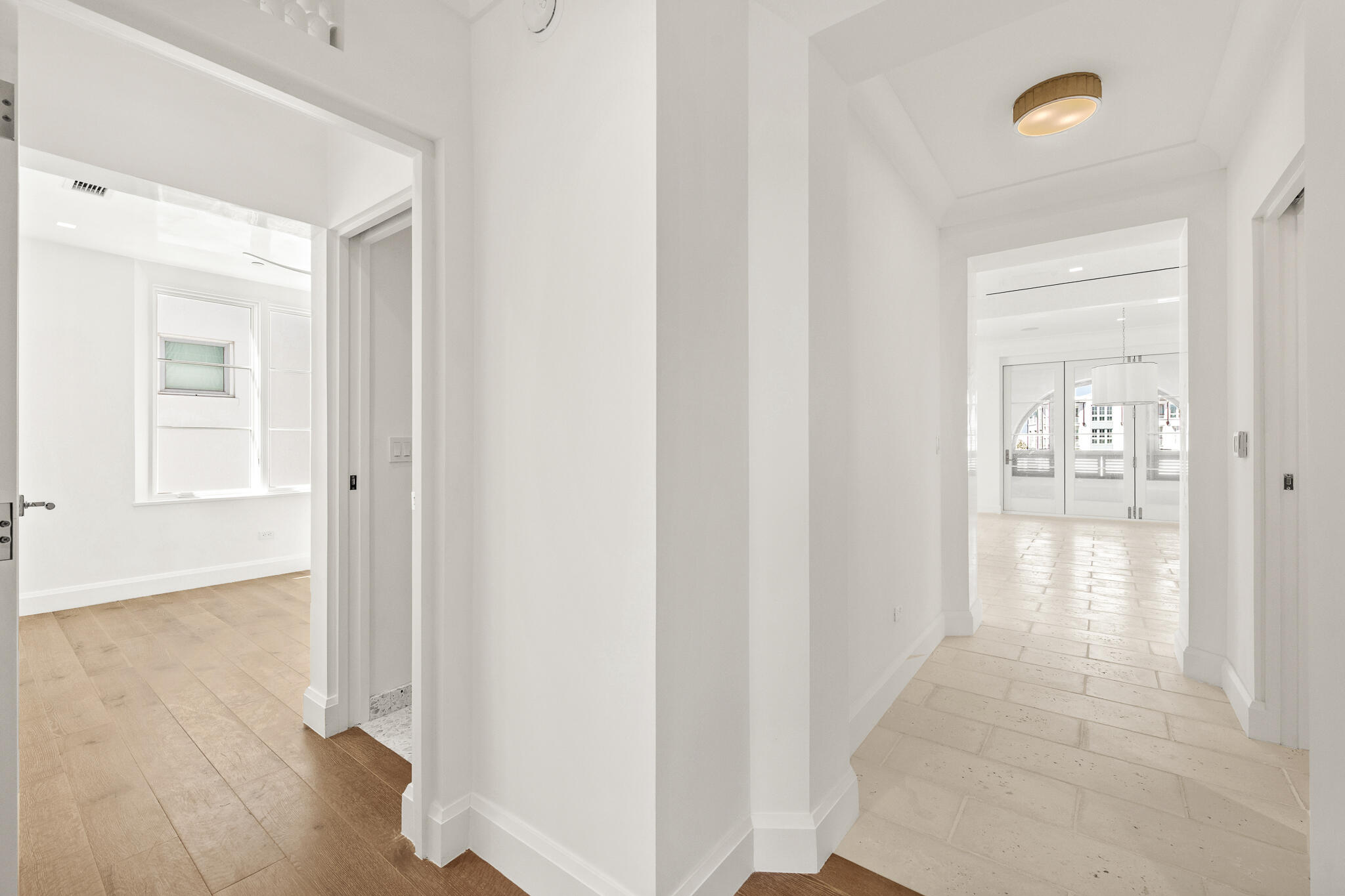 30 Mark Twain Lane, Unit 303 Inlet Beach, FL 32461 - Photo 26 of 34 a view of a hallway with wooden floor and a bathroom