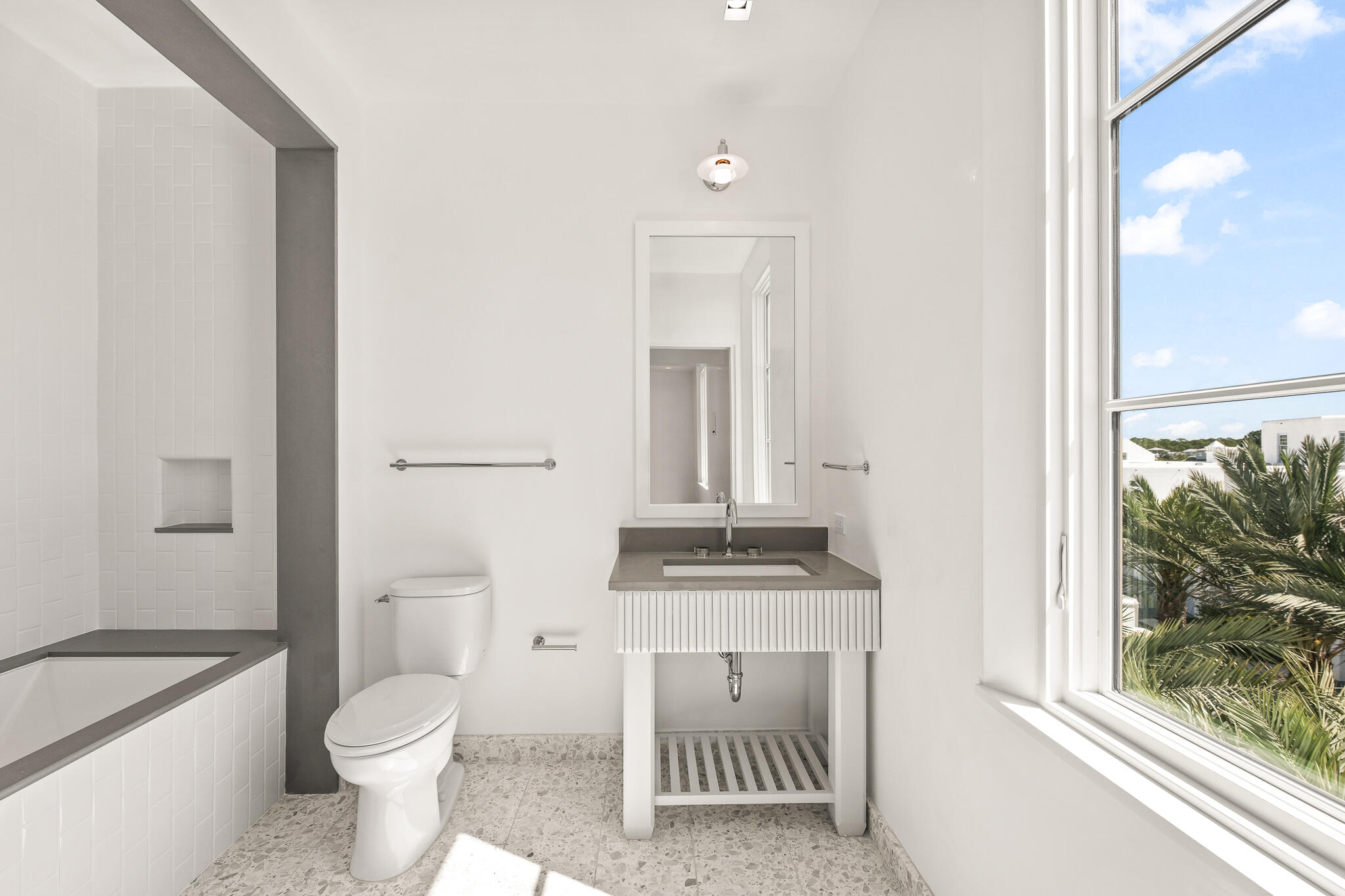 30 Mark Twain Lane, Unit 303 Inlet Beach, FL 32461 - Photo 30 of 34 a bathroom with a granite countertop toilet a sink and a bathtub