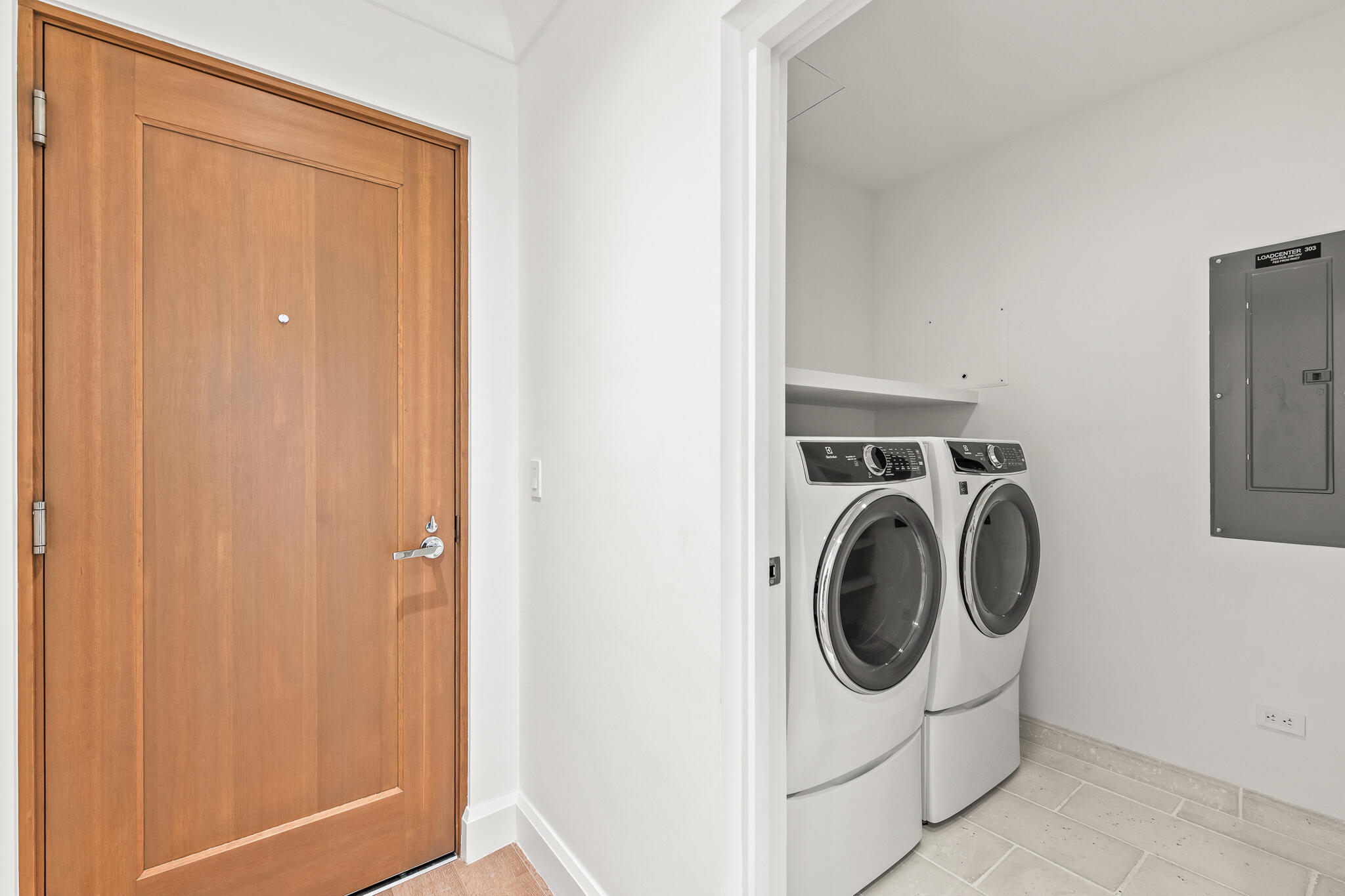 30 Mark Twain Lane, Unit 303 Inlet Beach, FL 32461 - Photo 7 of 34 a utility room with dryer and washer