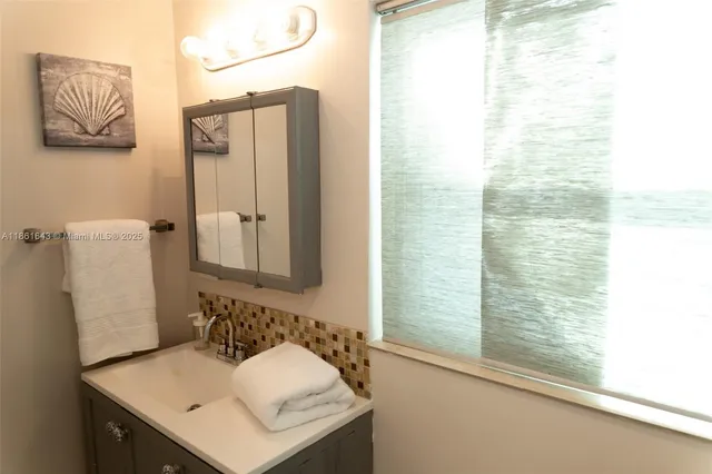 a en suite bathroom with a sink