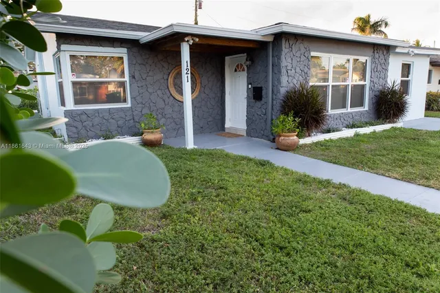 a view of a garden with an outdoor space