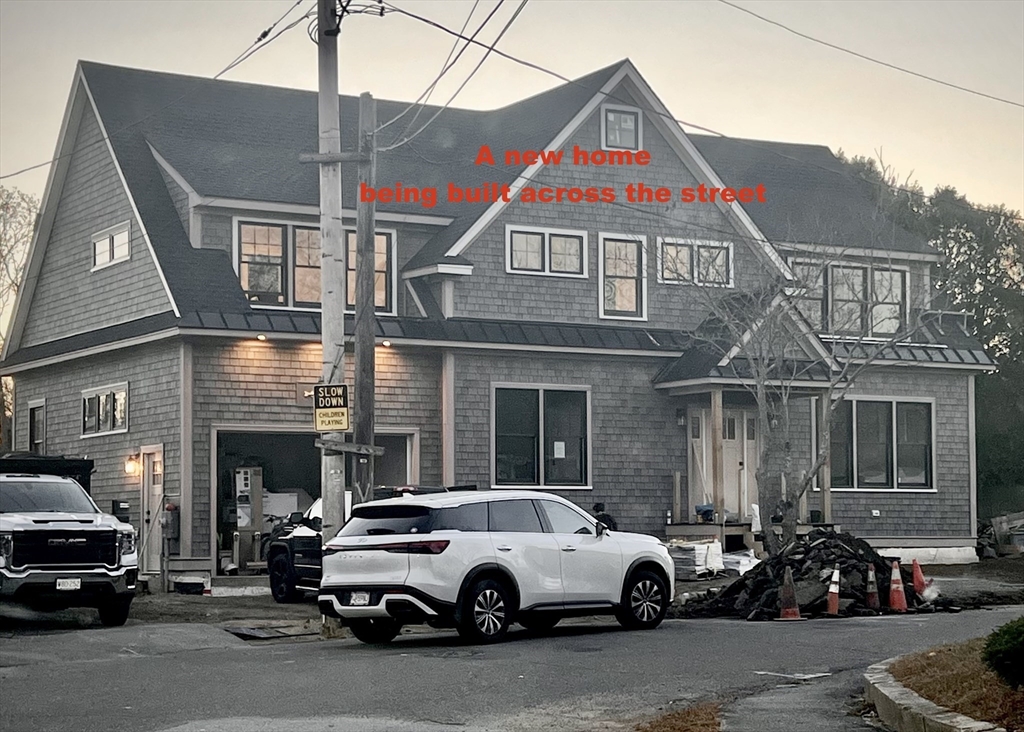 7 Ames Road Marblehead, MA 01945 - Photo 11 of 12 a car parked in front of a building