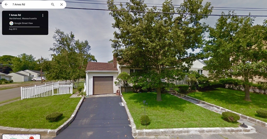 7 Ames Road Marblehead, MA 01945 - Photo 2 of 12 a front view of a house with a garden and yard