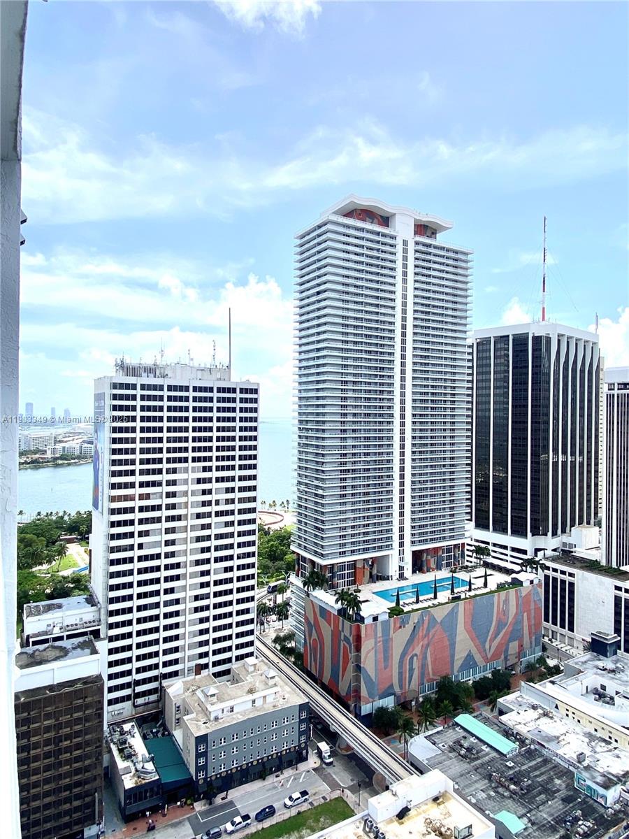 133 Northeast 2nd Avenue, Unit 2904 Miami, FL 33132 - Photo 9 of 11 a front view of a building with glass windows