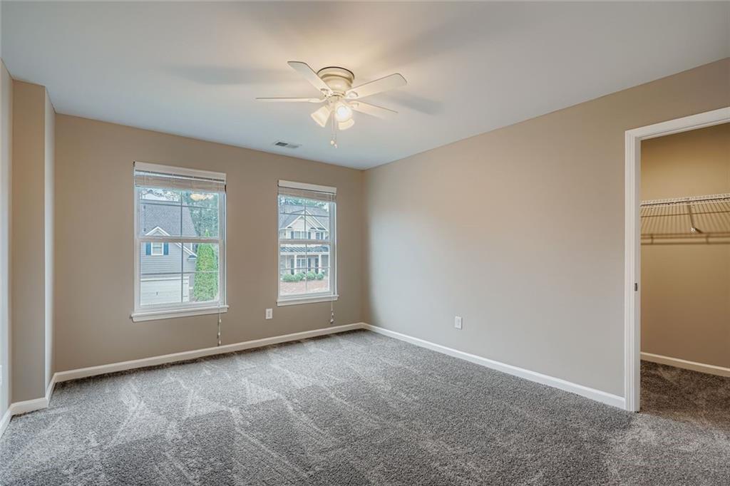 114 Greenbrier Way Canton, GA 30114 - Photo 20 of 32 a view of an empty room with a window