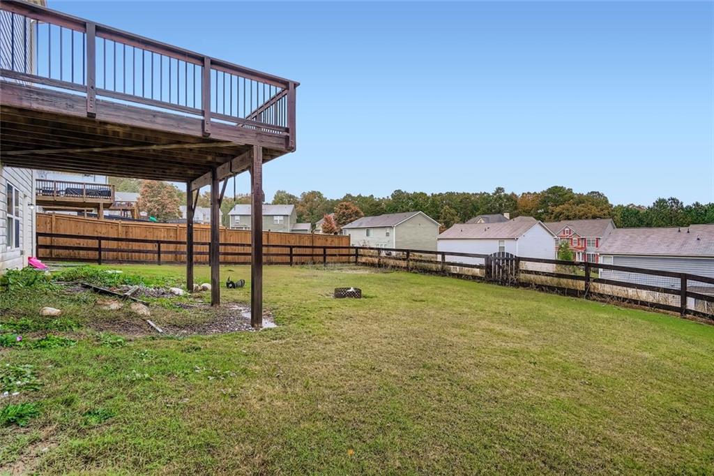 114 Greenbrier Way Canton, GA 30114 - Photo 24 of 32 a view of a house with backyard and swimming pool