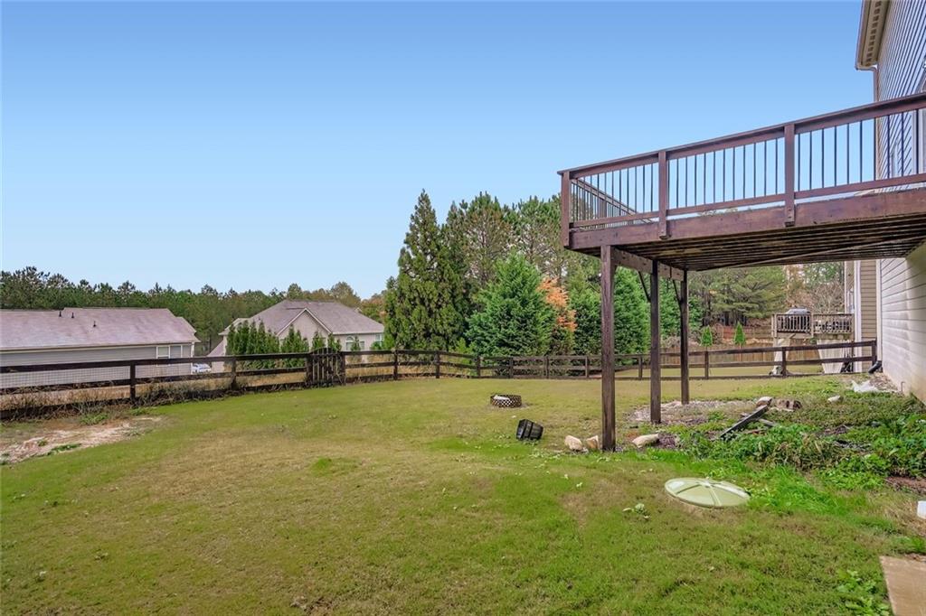114 Greenbrier Way Canton, GA 30114 - Photo 25 of 32 a view of a house with pool and a yard
