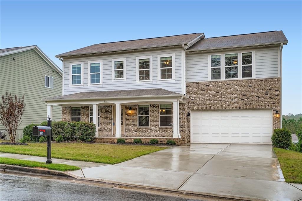114 Greenbrier Way Canton, GA 30114 - Photo 31 of 32 a front view of a house with garden