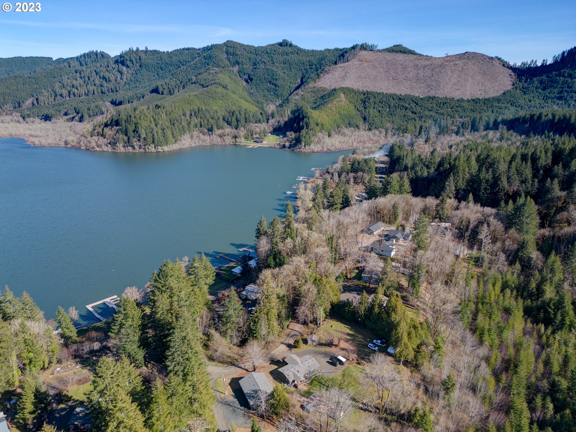 2 Lakes Lane Blachly, OR 97412 - Photo 11 of 12 an aerial view of a house with a mountain