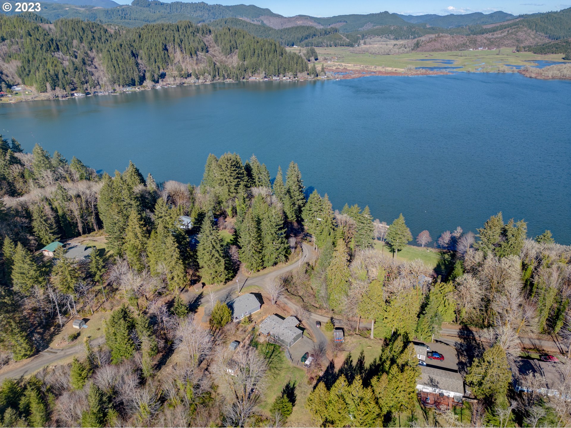 2 Lakes Lane Blachly, OR 97412 - Photo 12 of 12 an aerial view of a houses with a lake view