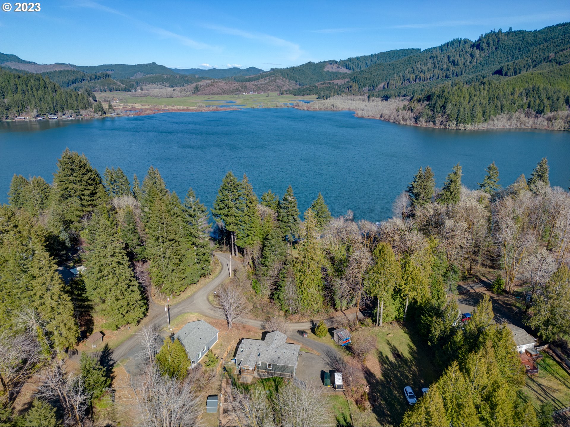 2 Lakes Lane Blachly, OR 97412 - Photo 3 of 12 a view of a lake with a mountain