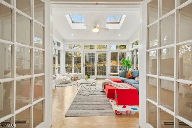 a kitchen with a sink cabinets and window