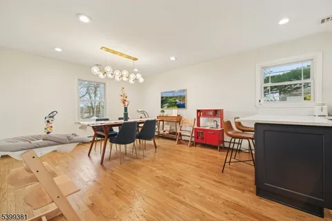 a kitchen with stainless steel appliances granite countertop a stove and a sink