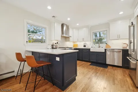 a bedroom with a bed and a bookshelf