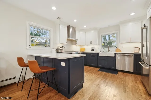 a bedroom with a bed and a bookshelf