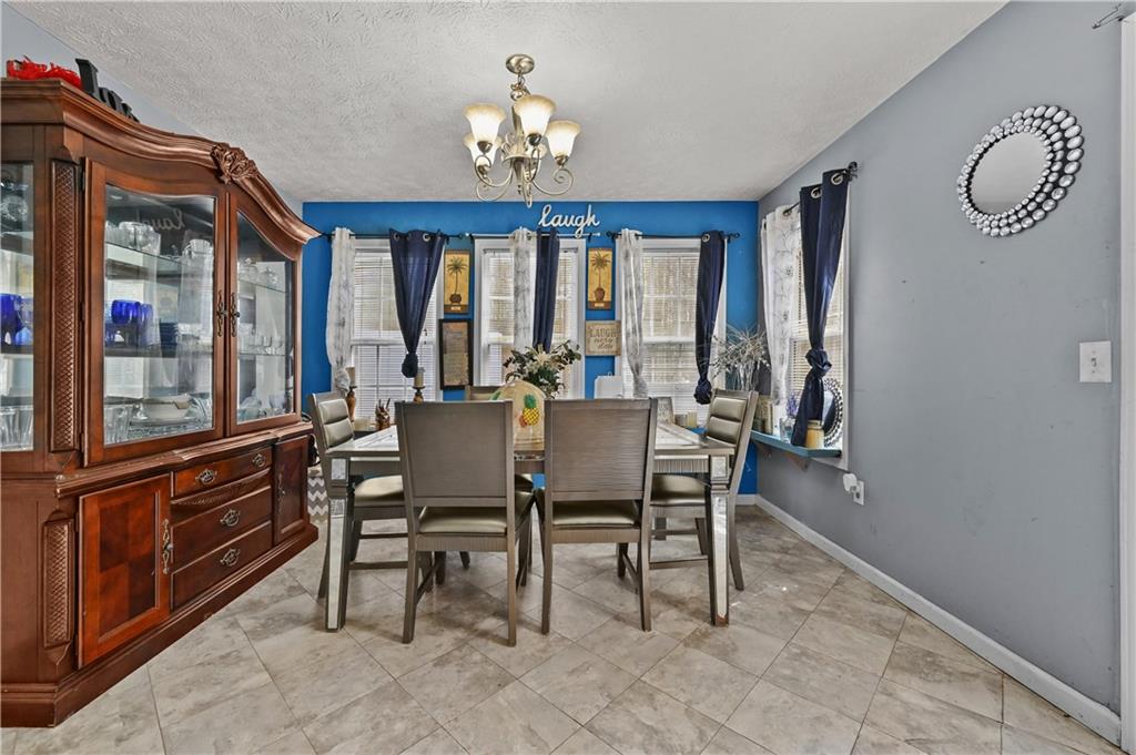 125 Tricias Way Temple, GA 30179 - Photo 13 of 39 a view of a dining room with furniture window and outside view