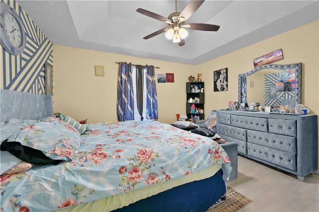 125 Tricias Way Temple, GA 30179 - Photo 17 of 39 a bedroom with a bed and dresser