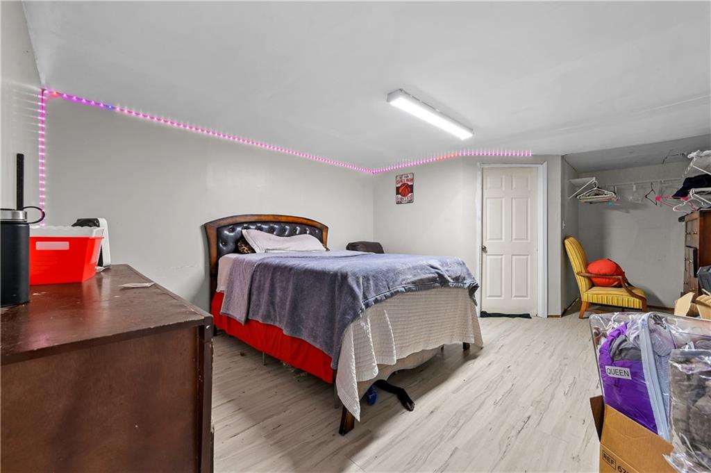 125 Tricias Way Temple, GA 30179 - Photo 29 of 39 a bedroom with a bed and dresser