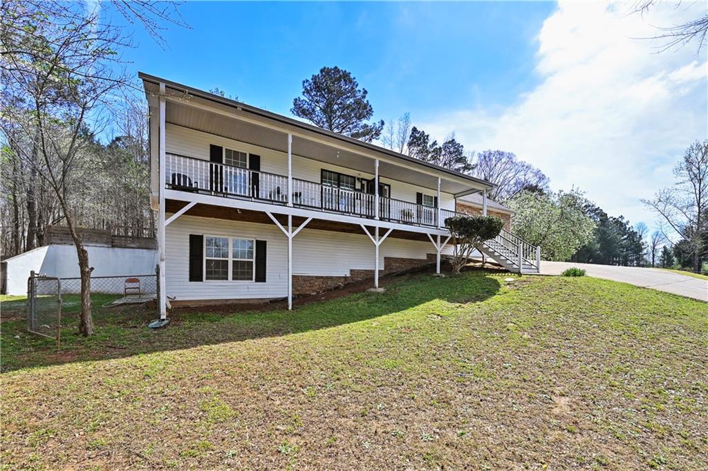 125 Tricias Way Temple, GA 30179 - Photo 4 of 39 a front view of a house with garden