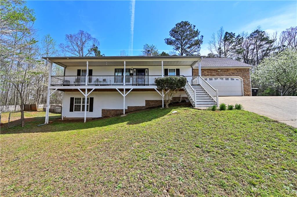 125 Tricias Way Temple, GA 30179 - Photo 5 of 39 front view of a house with a yard
