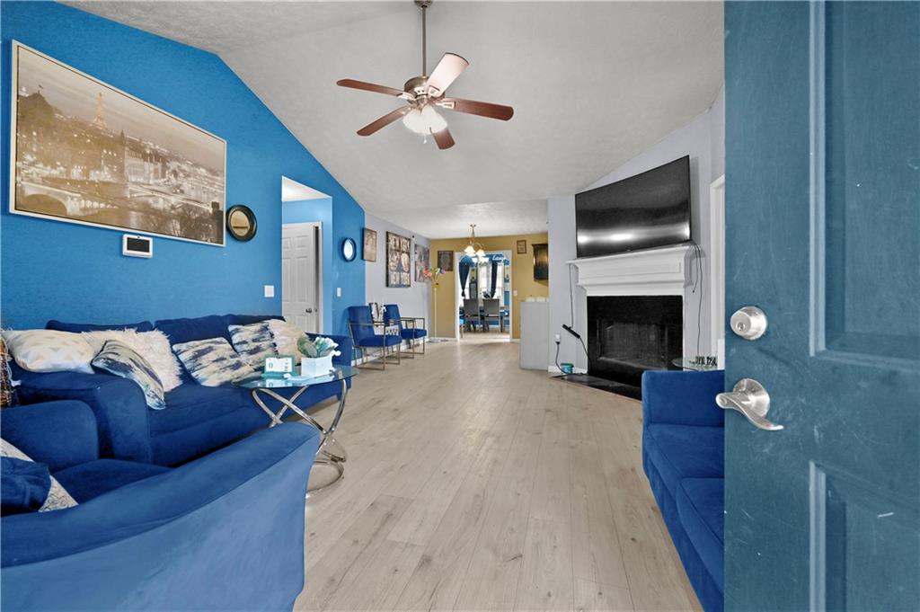 125 Tricias Way Temple, GA 30179 - Photo 6 of 39 a living room with furniture and a fireplace