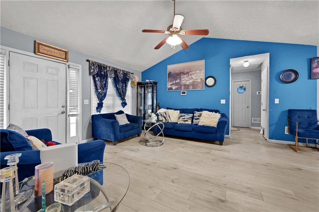 125 Tricias Way Temple, GA 30179 - Photo 7 of 39 a bedroom with furniture and a chandelier