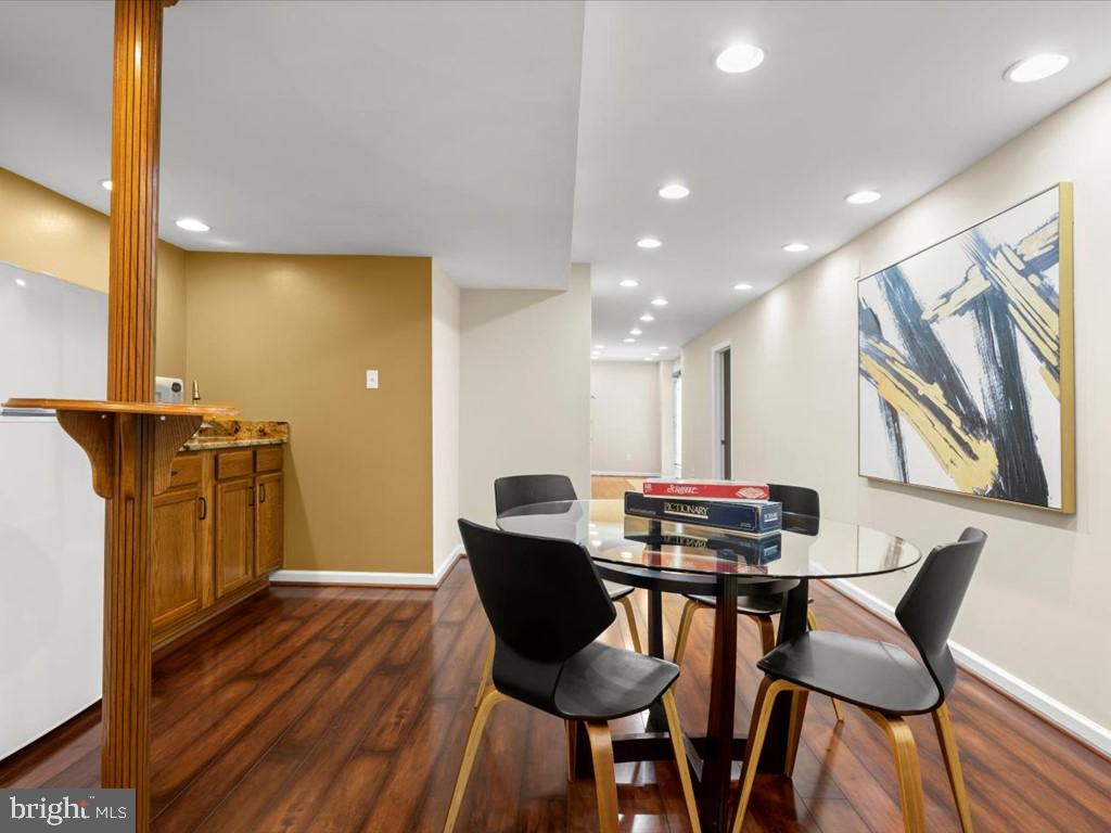 12709 Roark Court Reston, VA 20191 - Photo 40 of 51 Basement wet bar area