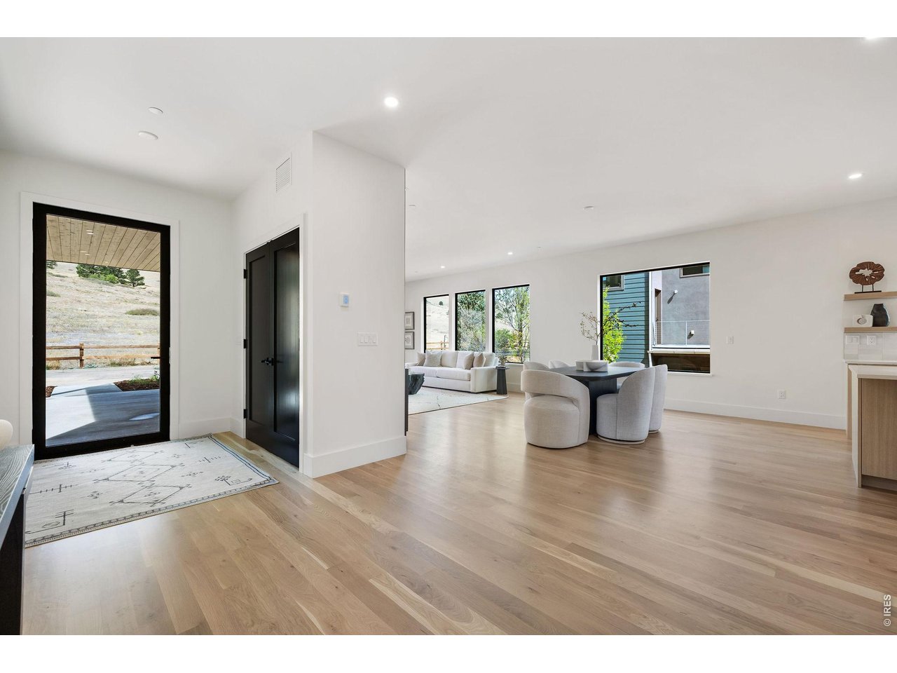 5354 2nd Street Boulder, CO 80304 - Photo 15 of 50 a view of an empty room with window and wooden floor