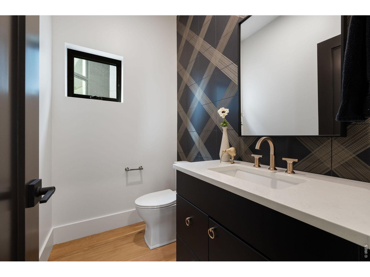 5354 2nd Street Boulder, CO 80304 - Photo 33 of 50 a bathroom with a sink toilet and mirror