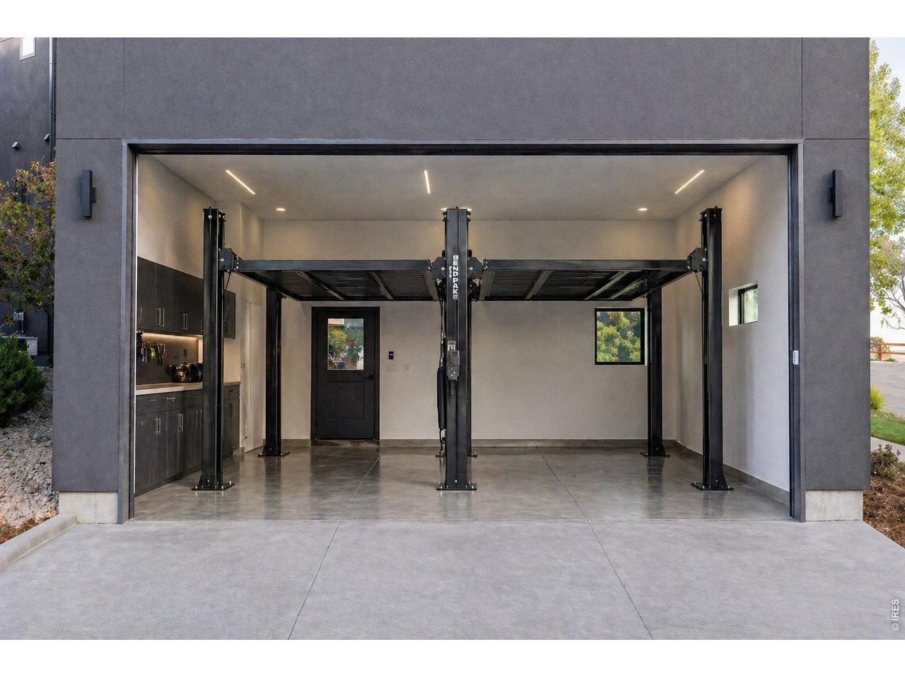 5354 2nd Street Boulder, CO 80304 - Photo 44 of 50 Ai rendering of car lift in garage.