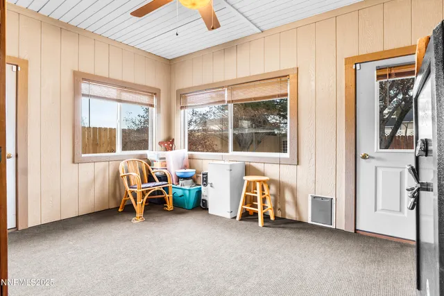 a view of room with furniture and a window