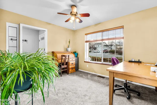 a room with furniture and a window